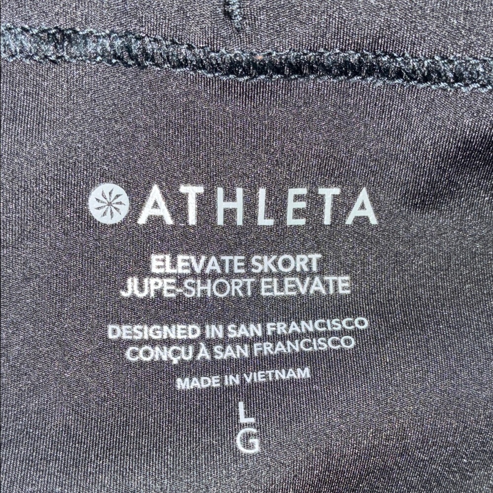 ATHLETA Black Pleated Mini Skirt with built in shorts. L - Picture 9 of 14